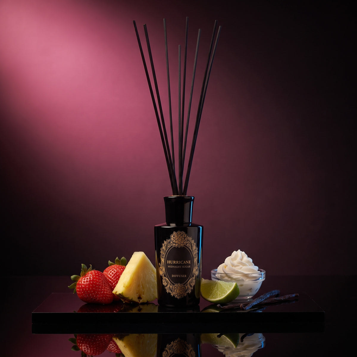 HURRICANE Midnight Sugar reed diffuser: a black bottle with a gold oval label, black reeds and its notes around it.