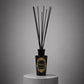 HURRICANE Quiet Amber reed diffuser, the bottle with its reeds