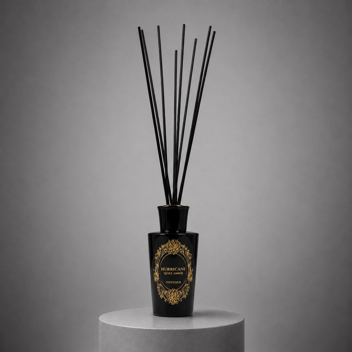 HURRICANE Quiet Amber reed diffuser, the bottle with its reeds